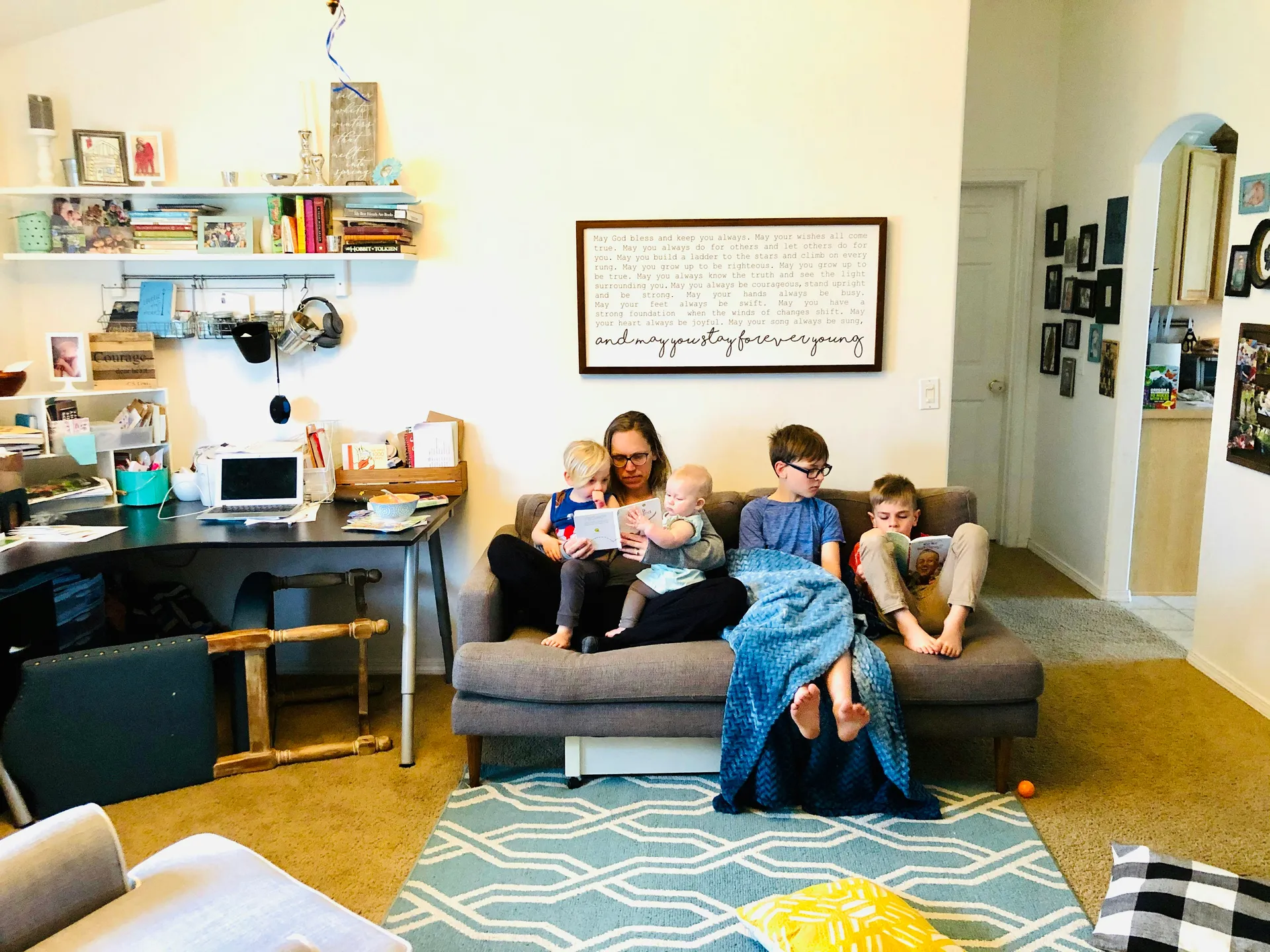 family relaxing comfortably on a couch. - whole house dehumidifier houston